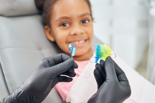 Orthodontic retainers after braces treatment